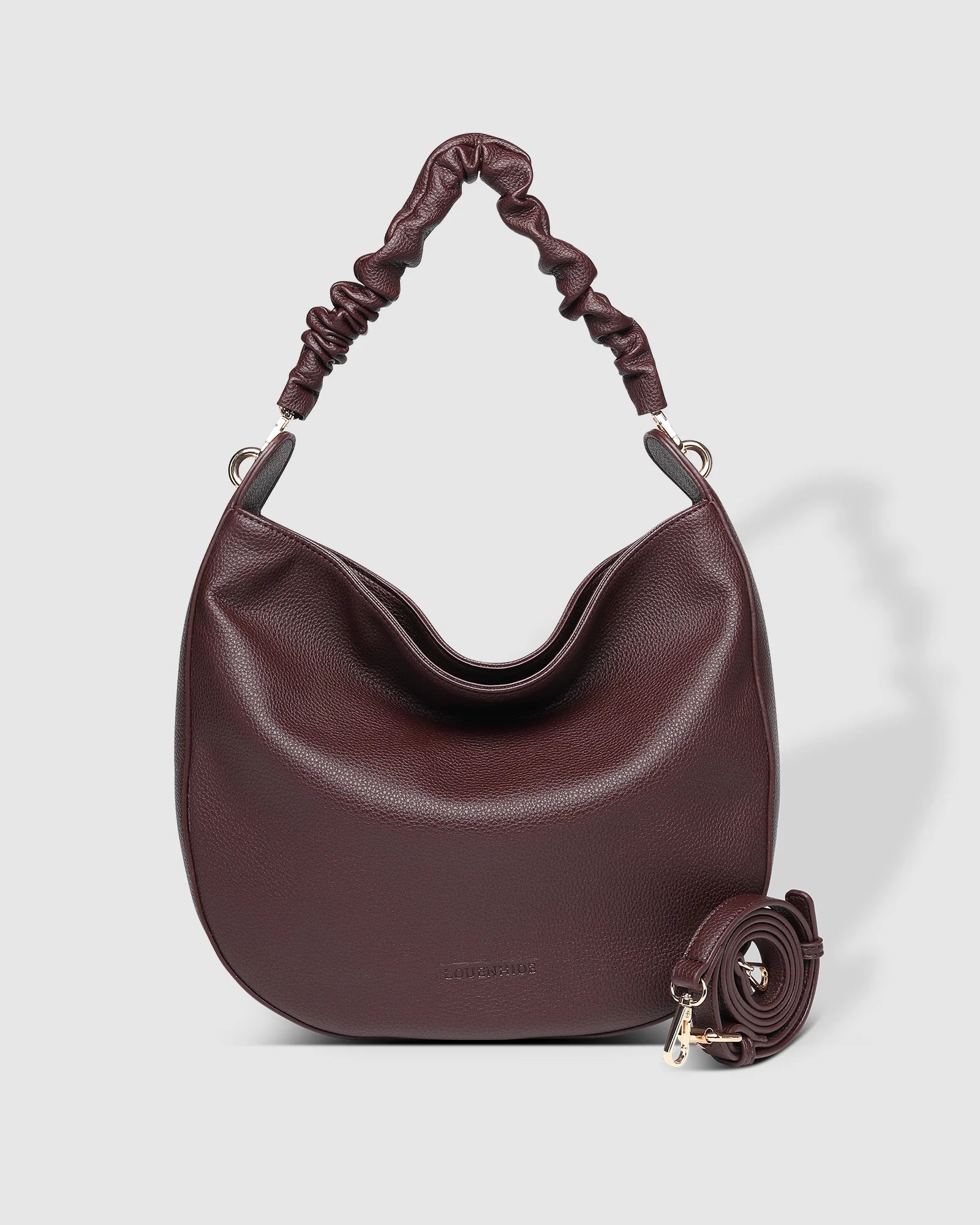 The Louenhide Emily Shoulder Bag is a contemporary women’s hobo bag with an elevated style. Exuding a relaxed feel, this women’s everyday bag showcases a classic and timeless style that features a gorgeous, ruched shoulder strap.