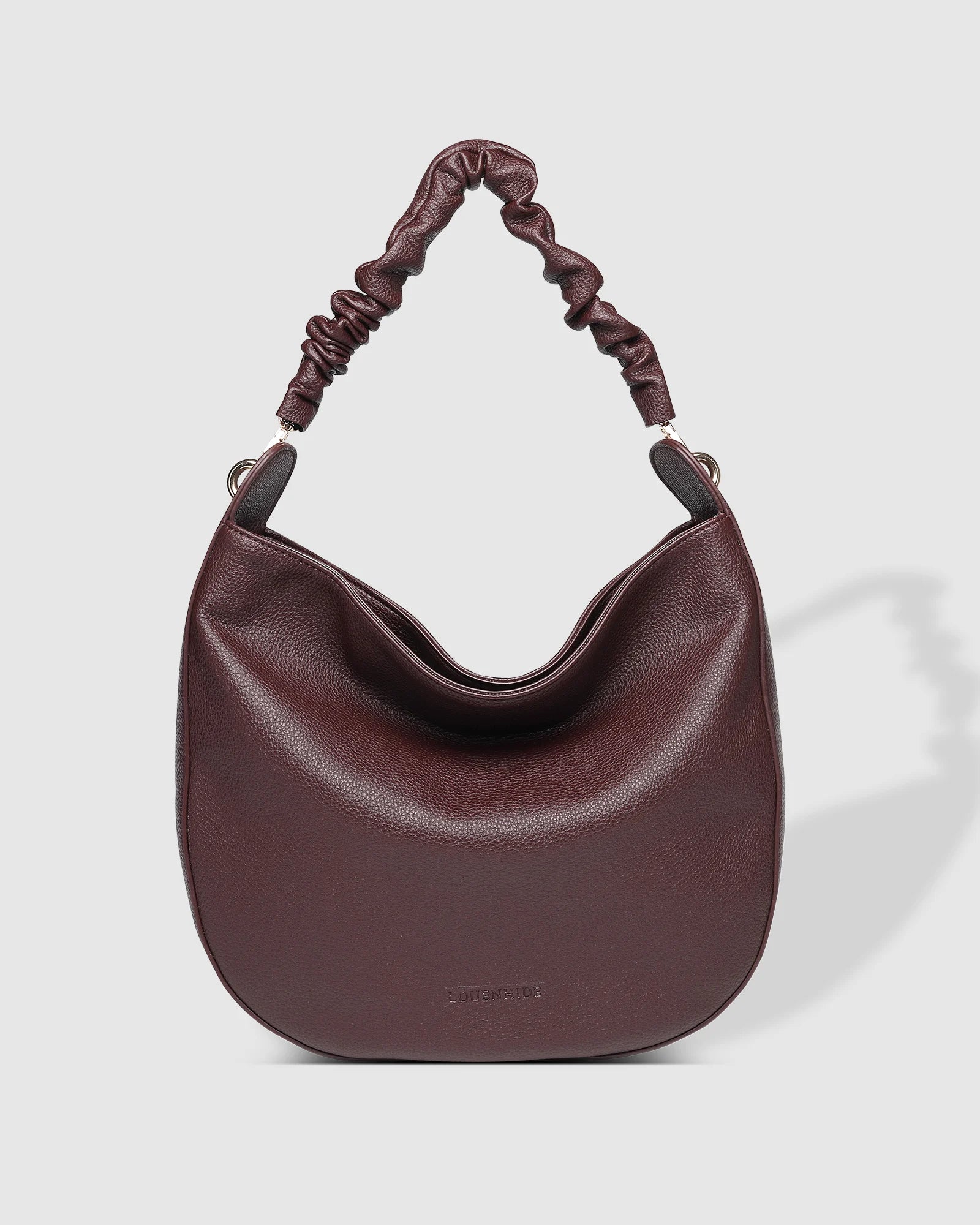 The Louenhide Emily Shoulder Bag is a contemporary women’s hobo bag with an elevated style. Exuding a relaxed feel, this women’s everyday bag showcases a classic and timeless style that features a gorgeous, ruched shoulder strap.