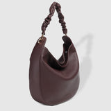 The Louenhide Emily Shoulder Bag is a contemporary women’s hobo bag with an elevated style. Exuding a relaxed feel, this women’s everyday bag showcases a classic and timeless style that features a gorgeous, ruched shoulder strap.