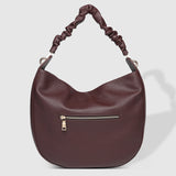 The Louenhide Emily Shoulder Bag is a contemporary women’s hobo bag with an elevated style. Exuding a relaxed feel, this women’s everyday bag showcases a classic and timeless style that features a gorgeous, ruched shoulder strap.