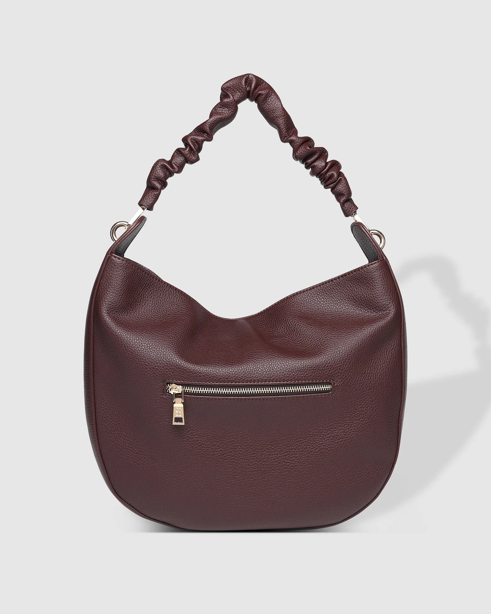 The Louenhide Emily Shoulder Bag is a contemporary women’s hobo bag with an elevated style. Exuding a relaxed feel, this women’s everyday bag showcases a classic and timeless style that features a gorgeous, ruched shoulder strap.