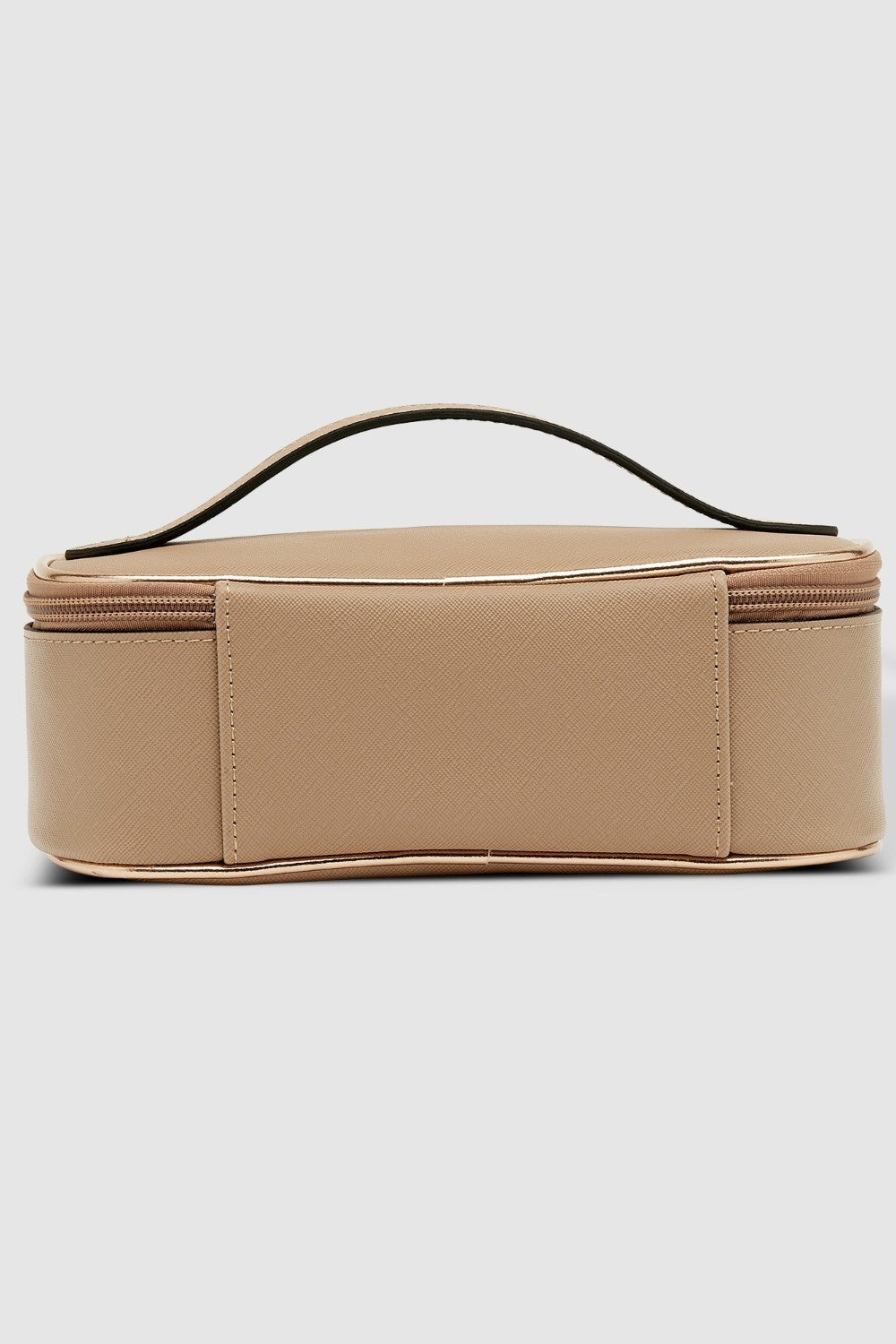 Beige cosmetic bag with a handle on a light gray background