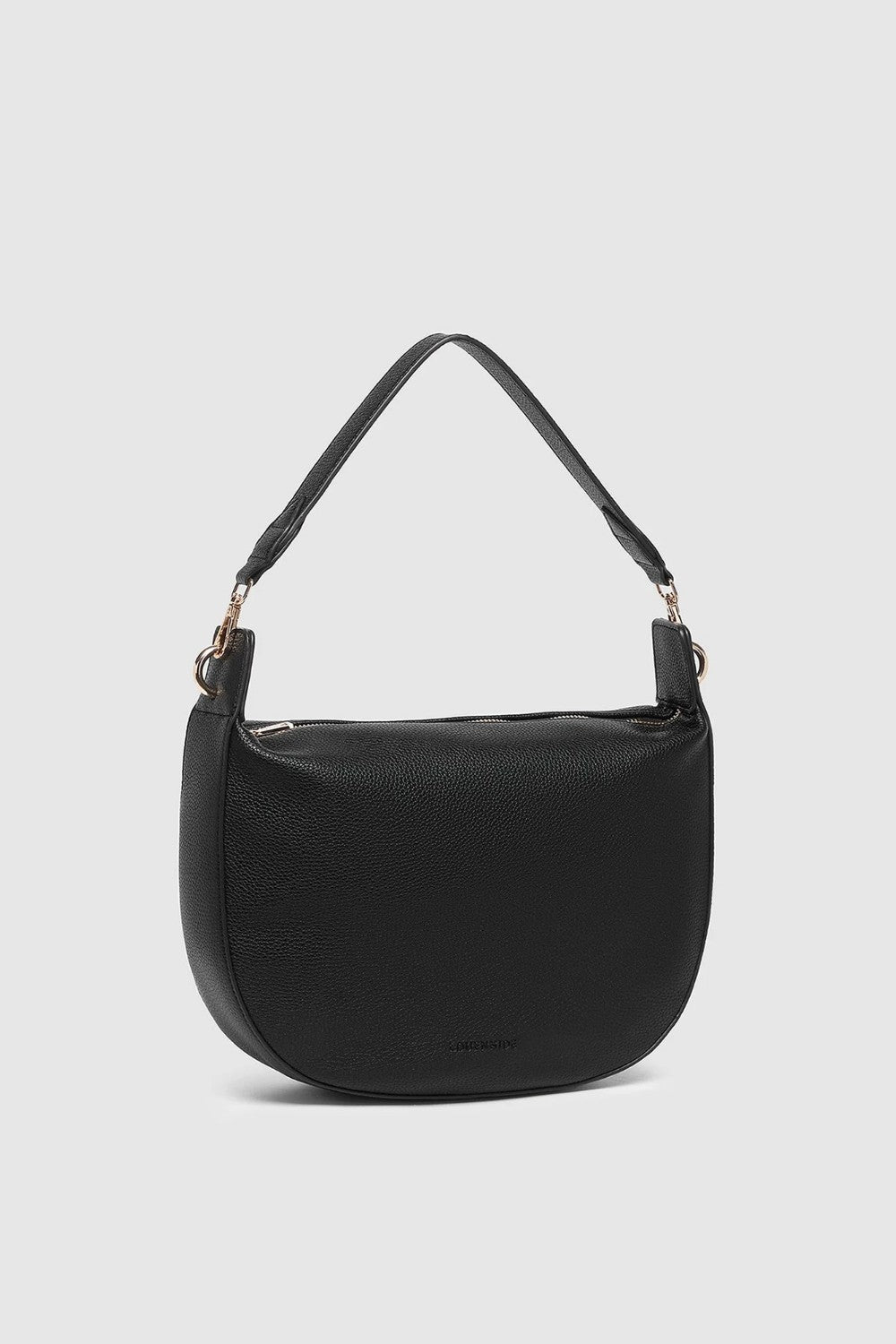 A black pebbled leather crescent-shaped shoulder bag with a single shoulder strap and gold-tone hardware, shown against a light gray background.