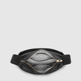 A black leather bag with striped lining, shown against a light gray background.