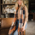 The Louenhide Glasgow Scarf is a timeless tartan pattern in gorgeous winter colourways.