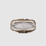 Vintage-style handbag with intricate design on a light gray background