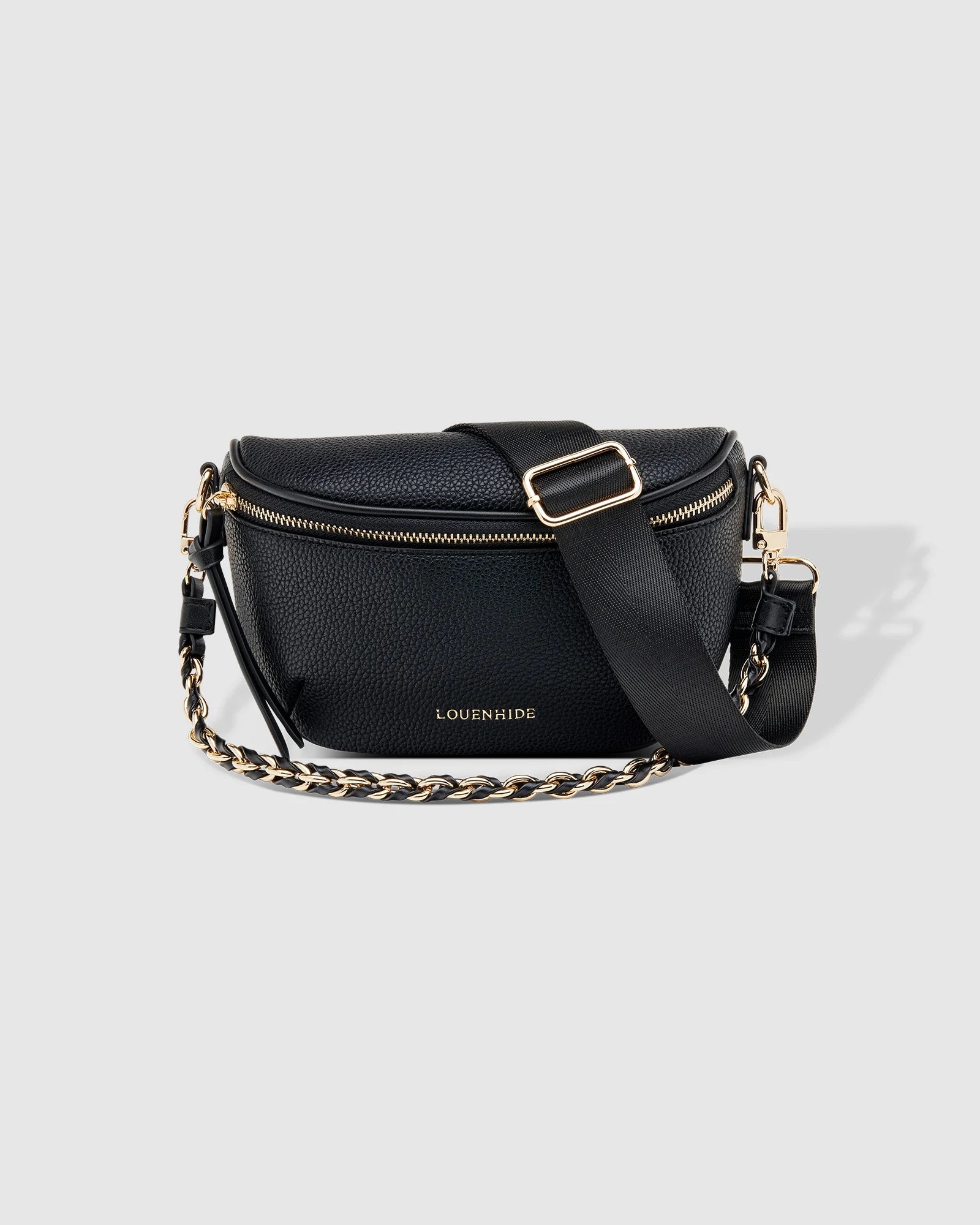 The Louenhide Halsey Sling Bag is where active meets an urban lifestyle. A Louenhide favourite and go-to for fuss free functionality, this soft vegan leather crossbody bag is designed with a secure front zip closure, backside zip pocket and internal zip pocket to keep all your belongings safe when you are on-the-go.