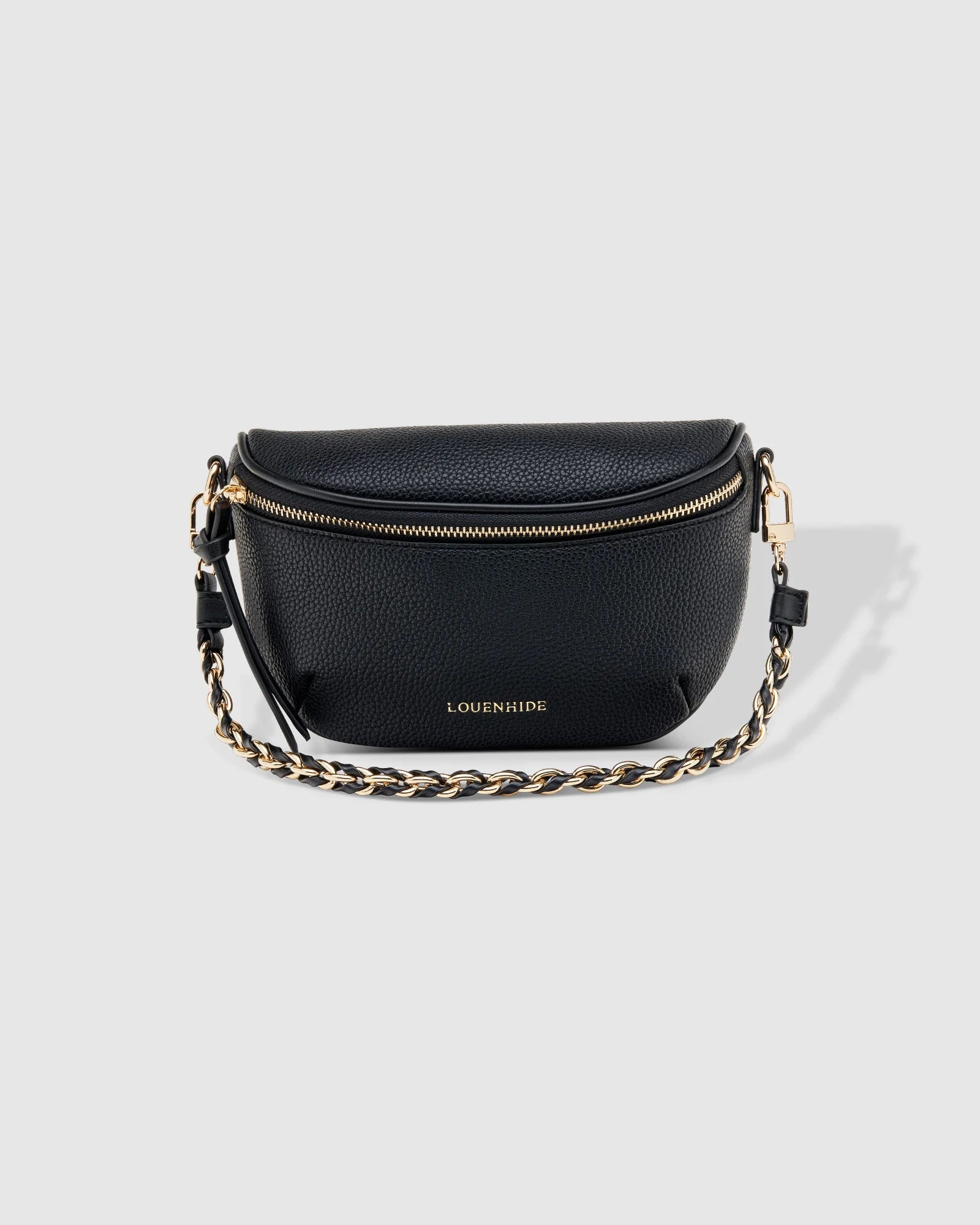 The Louenhide Halsey Sling Bag is where active meets an urban lifestyle. A Louenhide favourite and go-to for fuss free functionality, this soft vegan leather crossbody bag is designed with a secure front zip closure, backside zip pocket and internal zip pocket to keep all your belongings safe when you are on-the-go.