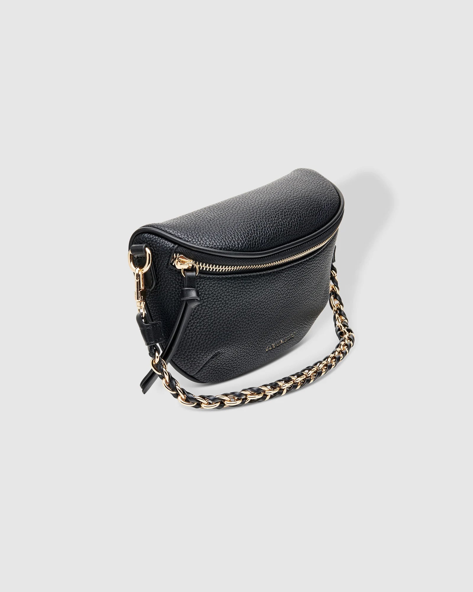 The Louenhide Halsey Sling Bag is where active meets an urban lifestyle. A Louenhide favourite and go-to for fuss free functionality, this soft vegan leather crossbody bag is designed with a secure front zip closure, backside zip pocket and internal zip pocket to keep all your belongings safe when you are on-the-go.