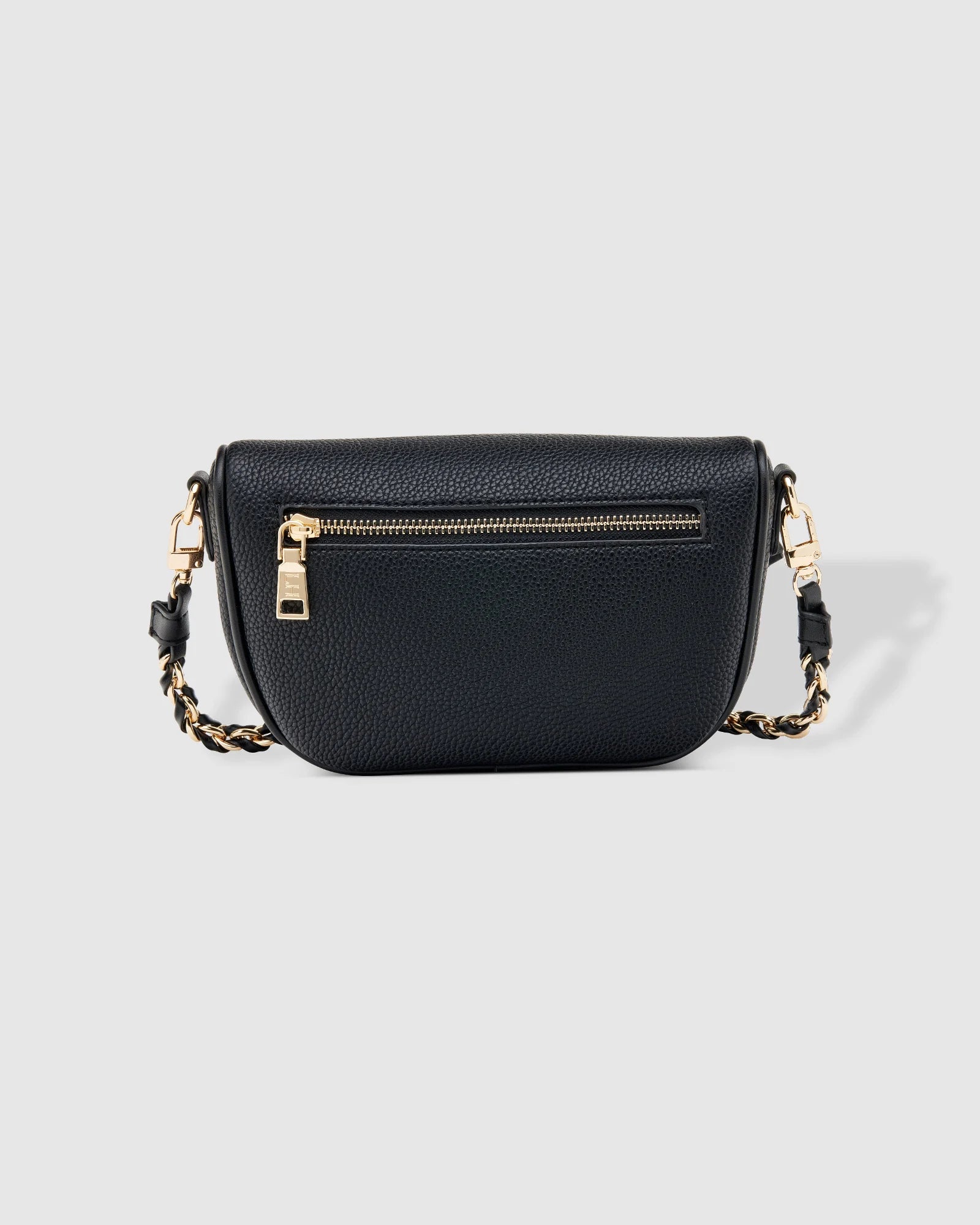 The Louenhide Halsey Sling Bag is where active meets an urban lifestyle. A Louenhide favourite and go-to for fuss free functionality, this soft vegan leather crossbody bag is designed with a secure front zip closure, backside zip pocket and internal zip pocket to keep all your belongings safe when you are on-the-go.