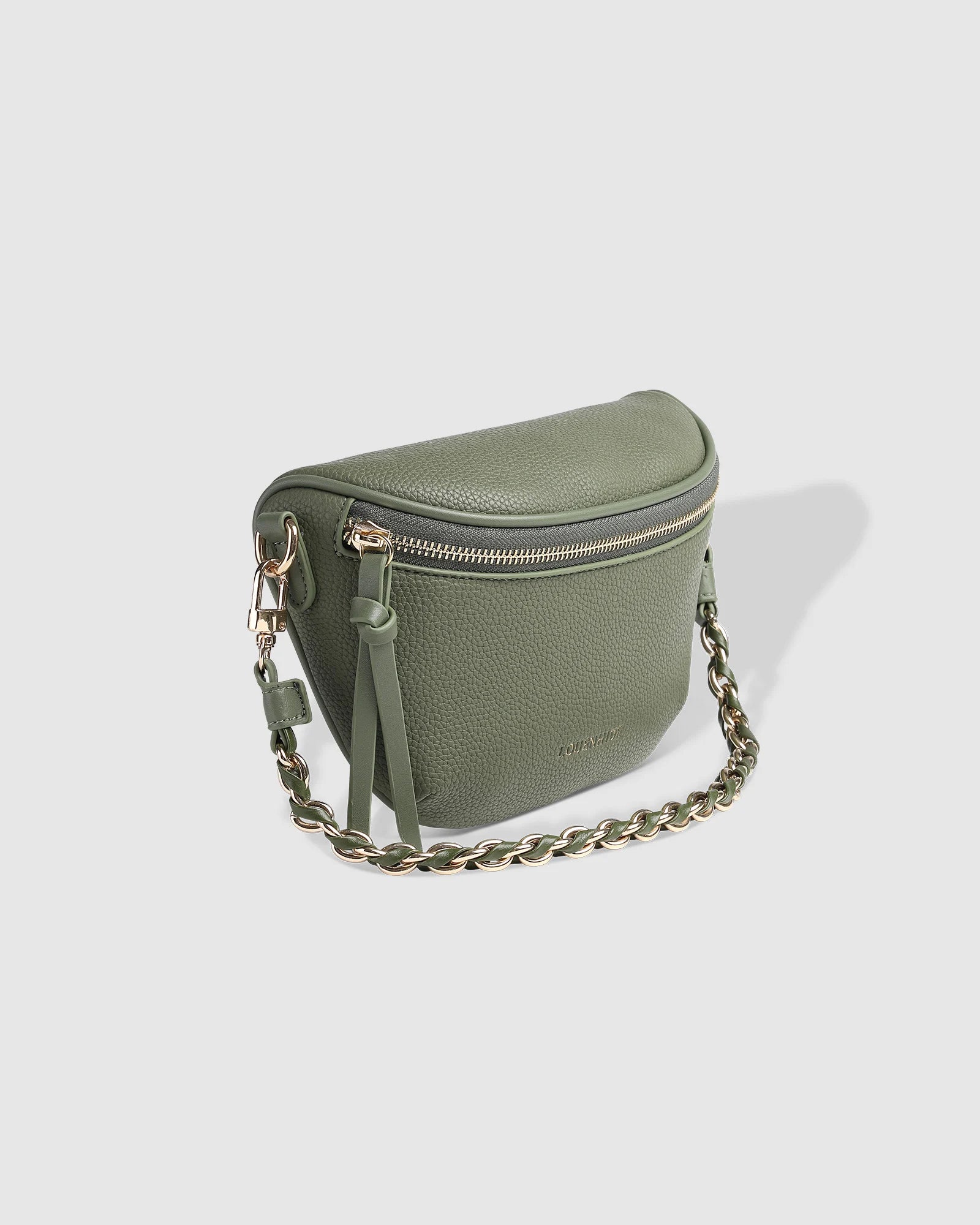 The Louenhide Halsey Sling Bag is where active meets an urban lifestyle. A Louenhide favourite and go-to for fuss free functionality, this soft vegan leather crossbody bag is designed with a secure front zip closure, backside zip pocket and internal zip pocket to keep all your belongings safe when you are on-the-go.