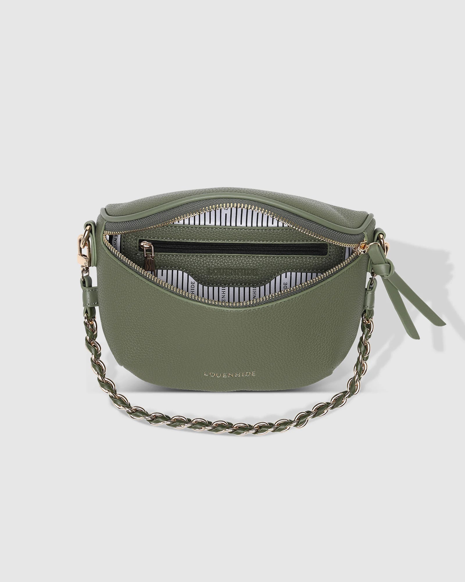 The Louenhide Halsey Sling Bag is where active meets an urban lifestyle. A Louenhide favourite and go-to for fuss free functionality, this soft vegan leather crossbody bag is designed with a secure front zip closure, backside zip pocket and internal zip pocket to keep all your belongings safe when you are on-the-go.