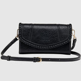 The Louenhide Harlow Crossbody Bag is a timeless, year-round wardrobe staple featuring a subtle woven vegan leather trim. Whether you are heading to brunch or afternoon drinks, the detachable and adjustable crossbody strap allows you to seamlessly transition the Harlow from crossbody to clutch. With the two thoughtfully designed compartments and large zip pocket, organize your daily essentials with ease. Designed with an envelope silhouette to pair seamlessly with your wardrobe.