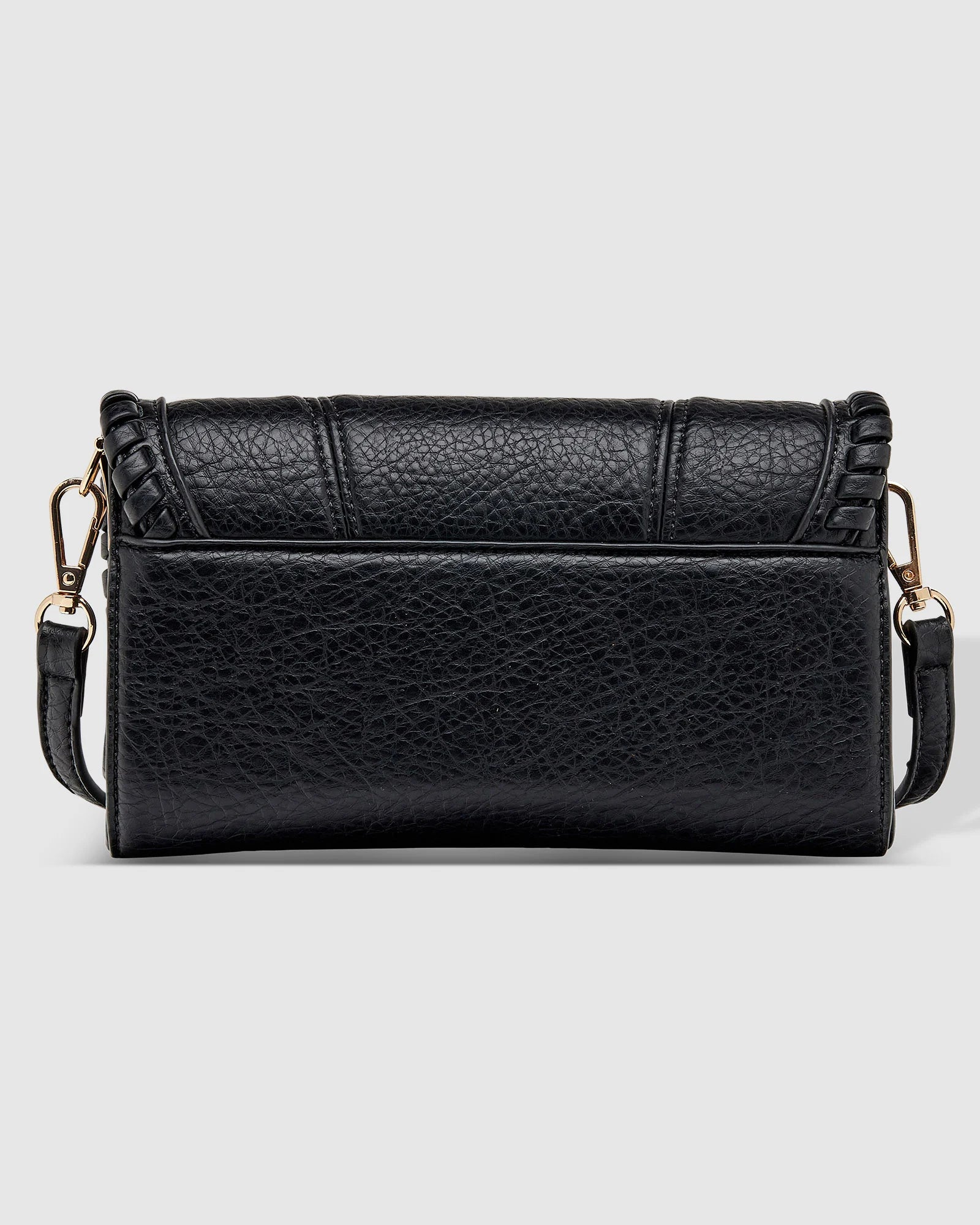 The Louenhide Harlow Crossbody Bag is a timeless, year-round wardrobe staple featuring a subtle woven vegan leather trim. Whether you are heading to brunch or afternoon drinks, the detachable and adjustable crossbody strap allows you to seamlessly transition the Harlow from crossbody to clutch. With the two thoughtfully designed compartments and large zip pocket, organize your daily essentials with ease. Designed with an envelope silhouette to pair seamlessly with your wardrobe.