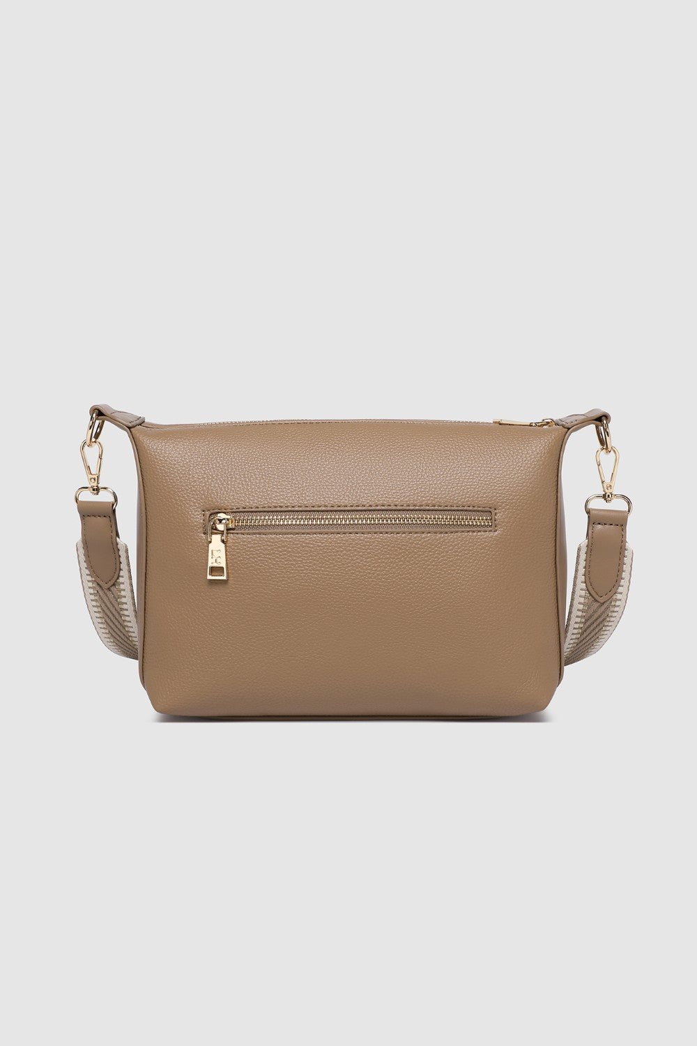 Brown pleather handbag with gold zipper on a light gray background
