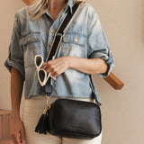 The Louenhide Jacinta Crossbody Bag with Gia Strap is the ultimate everyday bag for women looking for style without compromising function. Now in new season pastel colours and paired with a stylish matching guitar strap, feel luxe and sporty with this soft, camera style bag over your shoulder. Walk out in style with this casual crossbody bag and keep your essentials secure with its slip and zip pockets. The Jacinta is a staple in the Louenhide world, loved by women of all ages and style.