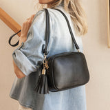 The Louenhide Jacinta Crossbody Bag with Gia Strap is the ultimate everyday bag for women looking for style without compromising function. Now in new season pastel colours and paired with a stylish matching guitar strap, feel luxe and sporty with this soft, camera style bag over your shoulder. Walk out in style with this casual crossbody bag and keep your essentials secure with its slip and zip pockets. The Jacinta is a staple in the Louenhide world, loved by women of all ages and style.