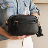 The Louenhide Jacinta Crossbody Bag with Gia Strap is the ultimate everyday bag for women looking for style without compromising function. Now in new season pastel colours and paired with a stylish matching guitar strap, feel luxe and sporty with this soft, camera style bag over your shoulder. Walk out in style with this casual crossbody bag and keep your essentials secure with its slip and zip pockets. The Jacinta is a staple in the Louenhide world, loved by women of all ages and style.