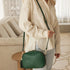 The Louenhide Jacinta Crossbody Bag with Gia Strap is the ultimate everyday bag for women looking for style without compromising function. Now in new season pastel colours and paired with a stylish matching guitar strap, feel luxe and sporty with this soft, camera style bag over your shoulder. Walk out in style with this casual crossbody bag and keep your essentials secure with its slip and zip pockets. The Jacinta is a staple in the Louenhide world, loved by women of all ages and style.