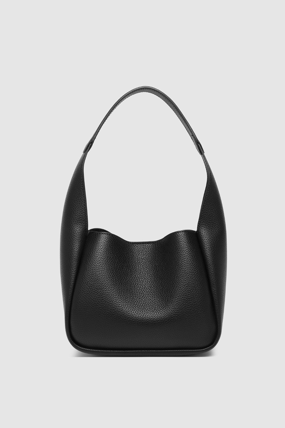 Black handbag on a light gray background