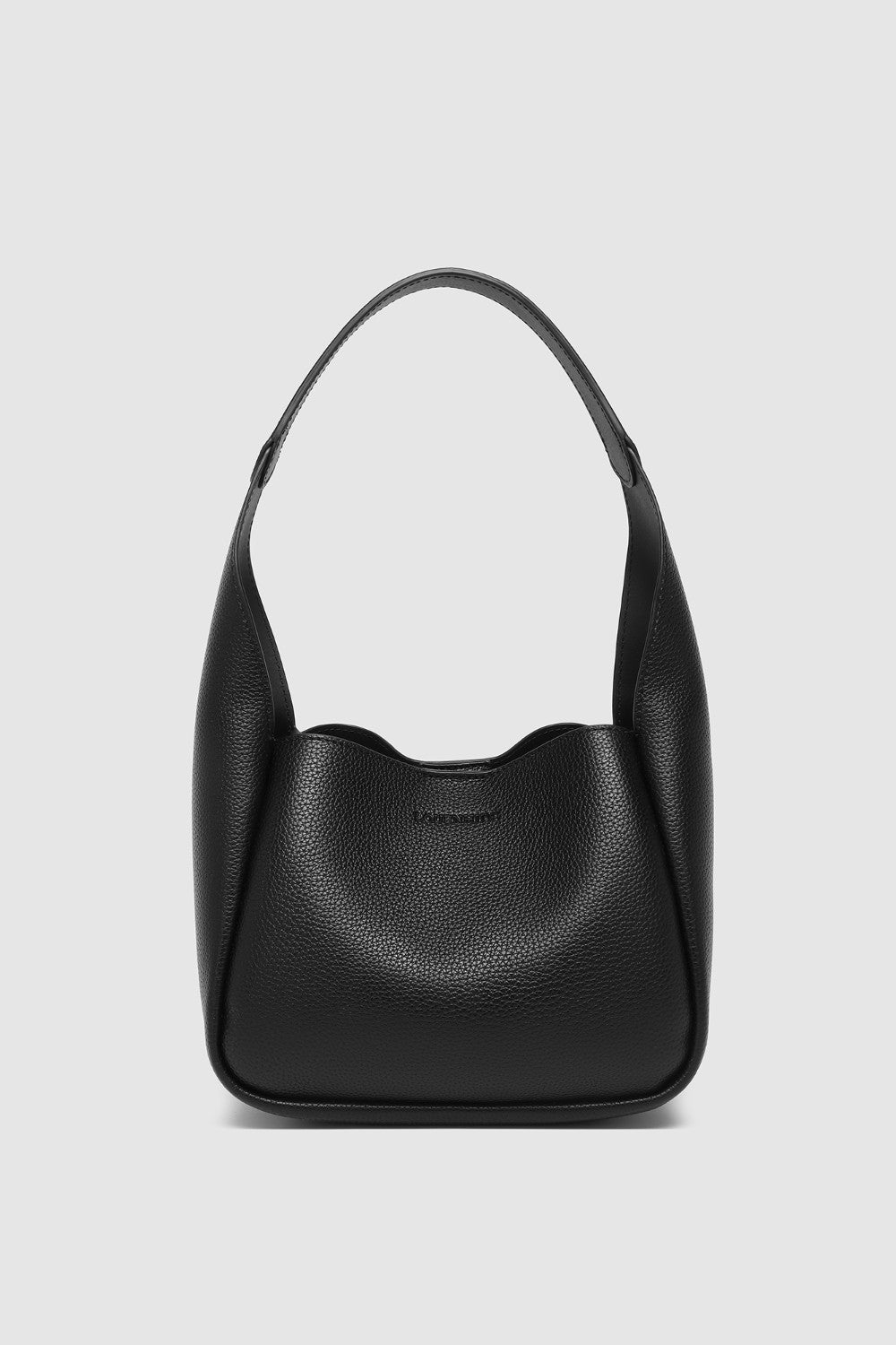 Black handbag on a light gray background