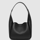 Black handbag on a light gray background