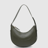 An olive green crescent-shaped leather shoulder bag with a single adjustable strap, shown against a light gray background.