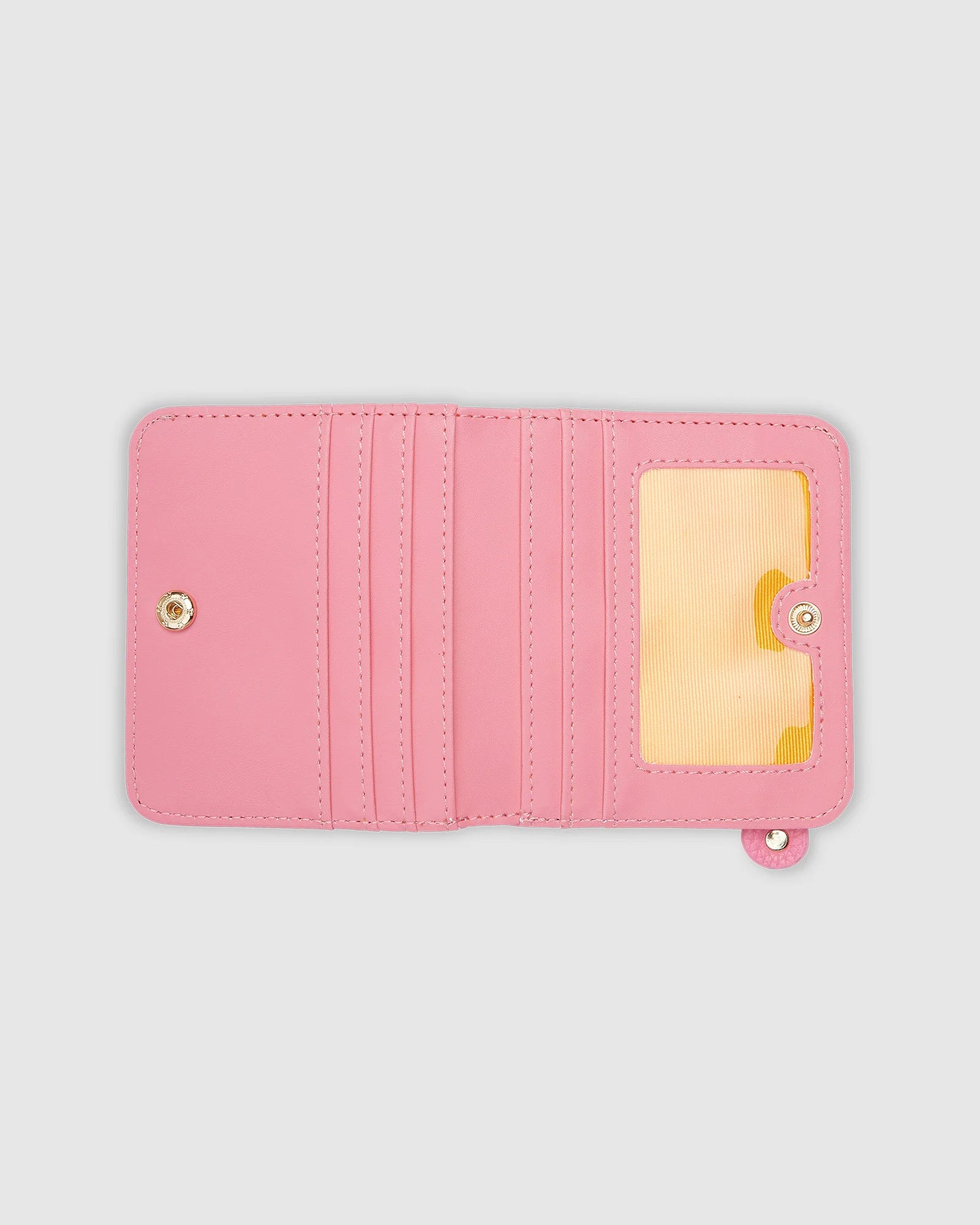 The Louenhide Lily Wallet is a must-have for the minimalist seeking a sleek and efficient way to carry their essentials. The ultimate accessory for compact organization and style, this refined design offers 7 cardholders and a secure zip pocket, so you won’t be fumbling through your wallet to find the right card or your loose change. Crafted from a luxe vegan leather, the Lily Wallet boasts a slim profile that easily slips into any pocket or bag without adding unnecessary bulk.