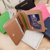 The Louenhide Lily Wallet is a must-have for the minimalist seeking a sleek and efficient way to carry their essentials. The ultimate accessory for compact organization and style, this refined design offers 7 cardholders and a secure zip pocket, so you won’t be fumbling through your wallet to find the right card or your loose change. Crafted from a luxe vegan leather, the Lily Wallet boasts a slim profile that easily slips into any pocket or bag without adding unnecessary bulk.