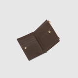 A dark brown leather wallet with a zippered compartment, shown open on a light background. 