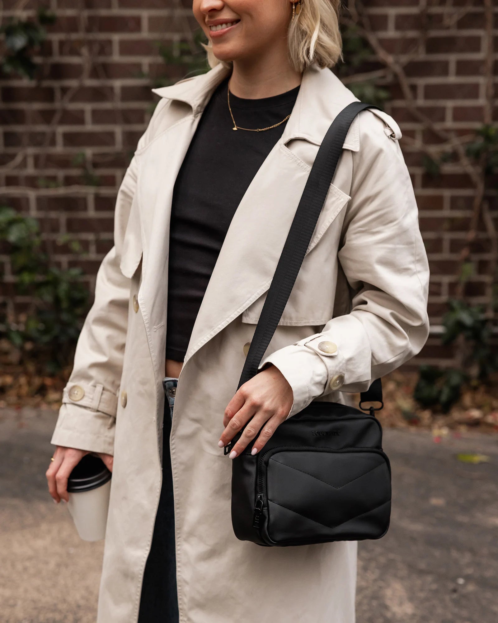 The Louenhide London Crossbody Bag strikes the perfect balance between simplicity and style. While the classic, compact, camera-bag shape is perfect for storing more than the everyday essentials, the multi-compartment design keeps everything you need within reach.  From your phone, wallet and keys to your digital camera, a small water bottle and more - when life is on-the-go, take a bag that’s built for movement. Featuring an adjustable webbing strap to ensure comfort, this women’s crossbody bag is the idea