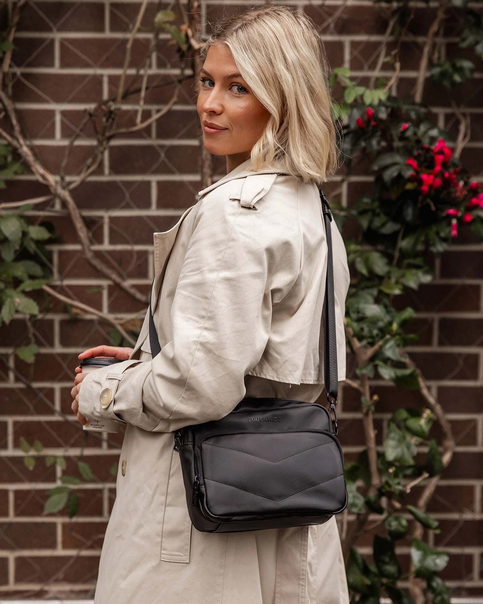 The Louenhide London Crossbody Bag strikes the perfect balance between simplicity and style. While the classic, compact, camera-bag shape is perfect for storing more than the everyday essentials, the multi-compartment design keeps everything you need within reach.  From your phone, wallet and keys to your digital camera, a small water bottle and more - when life is on-the-go, take a bag that’s built for movement. Featuring an adjustable webbing strap to ensure comfort, this women’s crossbody bag is the idea