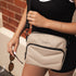 The Louenhide London Crossbody Bag strikes the perfect balance between simplicity and style. While the classic, compact, camera-bag shape is perfect for storing more than the everyday essentials, the multi-compartment design keeps everything you need within reach.&nbsp; From your phone, wallet and keys to your digital camera, a small water bottle and more - when life is on-the-go, take a bag that’s built for movement. Featuring an adjustable webbing strap to ensure comfort, this women’s crossbody bag is the