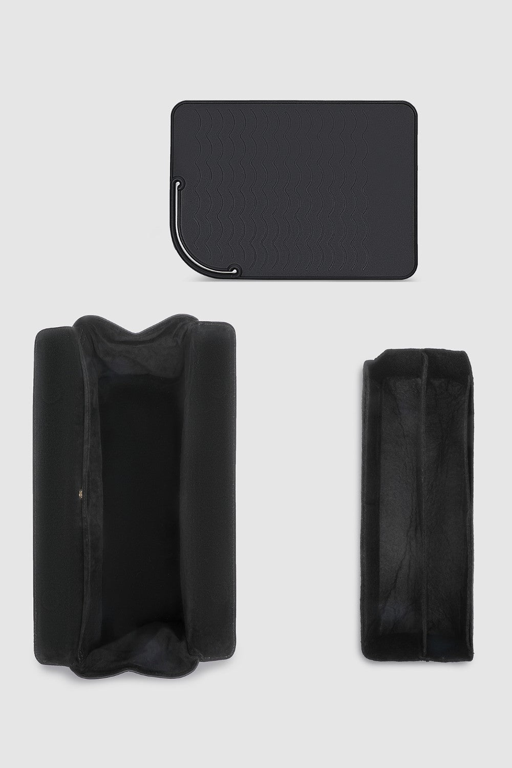 Black travel case on a light gray background