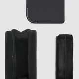 Black travel case on a light gray background