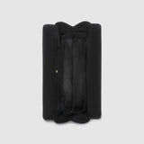 Black travel case on a light gray background