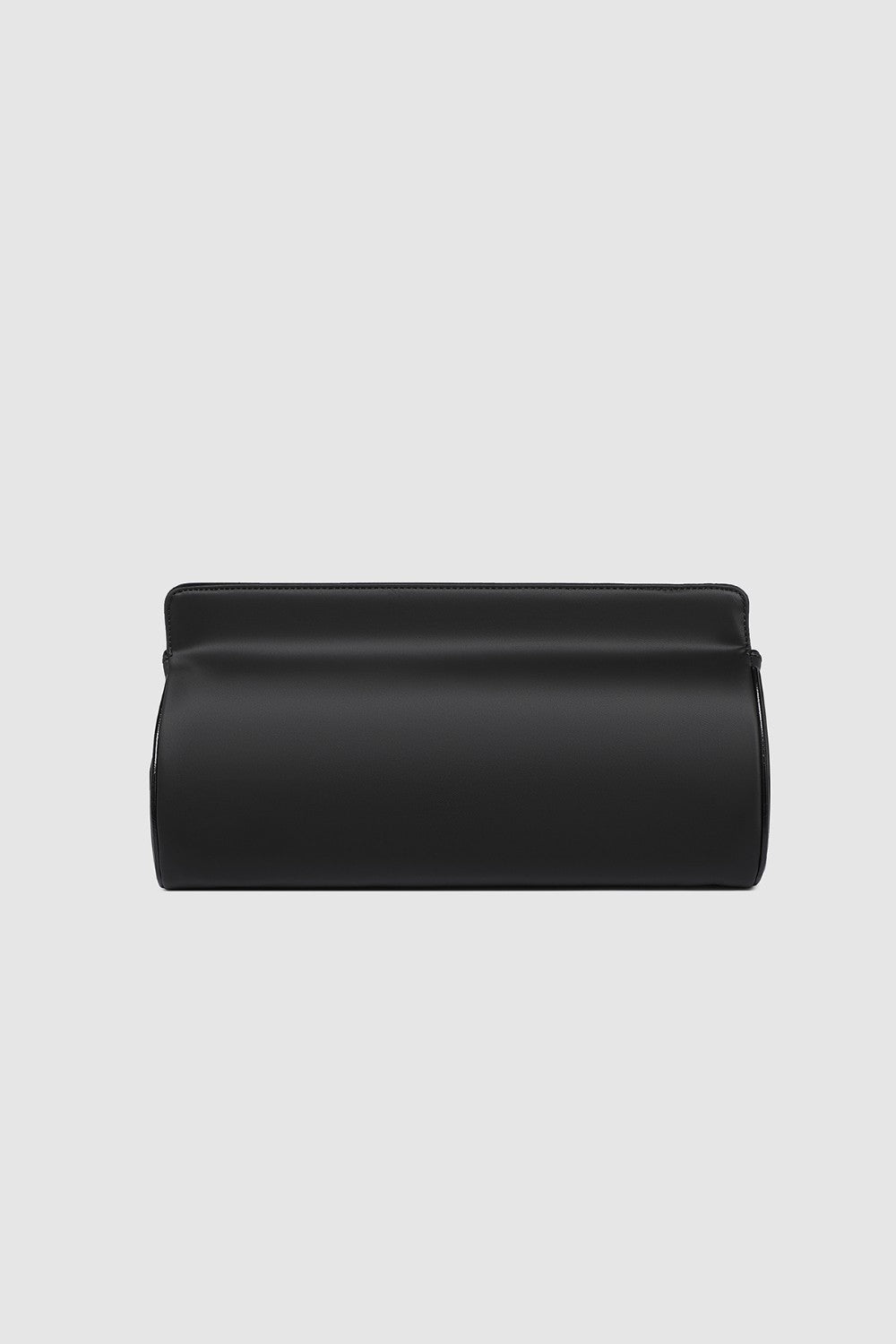 Black clutch bag on a light gray background