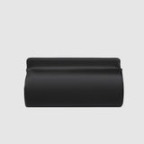 Black clutch bag on a light gray background