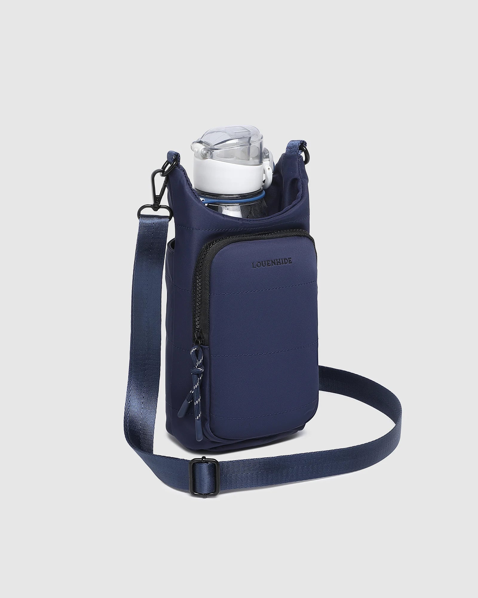 The Louenhide Miami Water Bottle Bag is a sleek, hands-free essential for an active, on-the-go lifestyle. With its slim, modern silhouette, this nylon water bottle crossbody bag is designed for effortless movement while keeping your water bottle secure and within reach.
