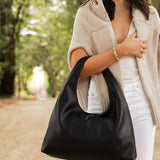 The Louenhide Monaco Shoulder Bag is the it-girl bag of the season. Whether it's a day at the office, a girls' lunch, or a casual outing, the Monaco is suited for any occasion. Her slouchy, minimalistic design adds a soft yet sleek element to the shoulder bags exterior while also allowing ample interior space to fit your everyday essentials and more.