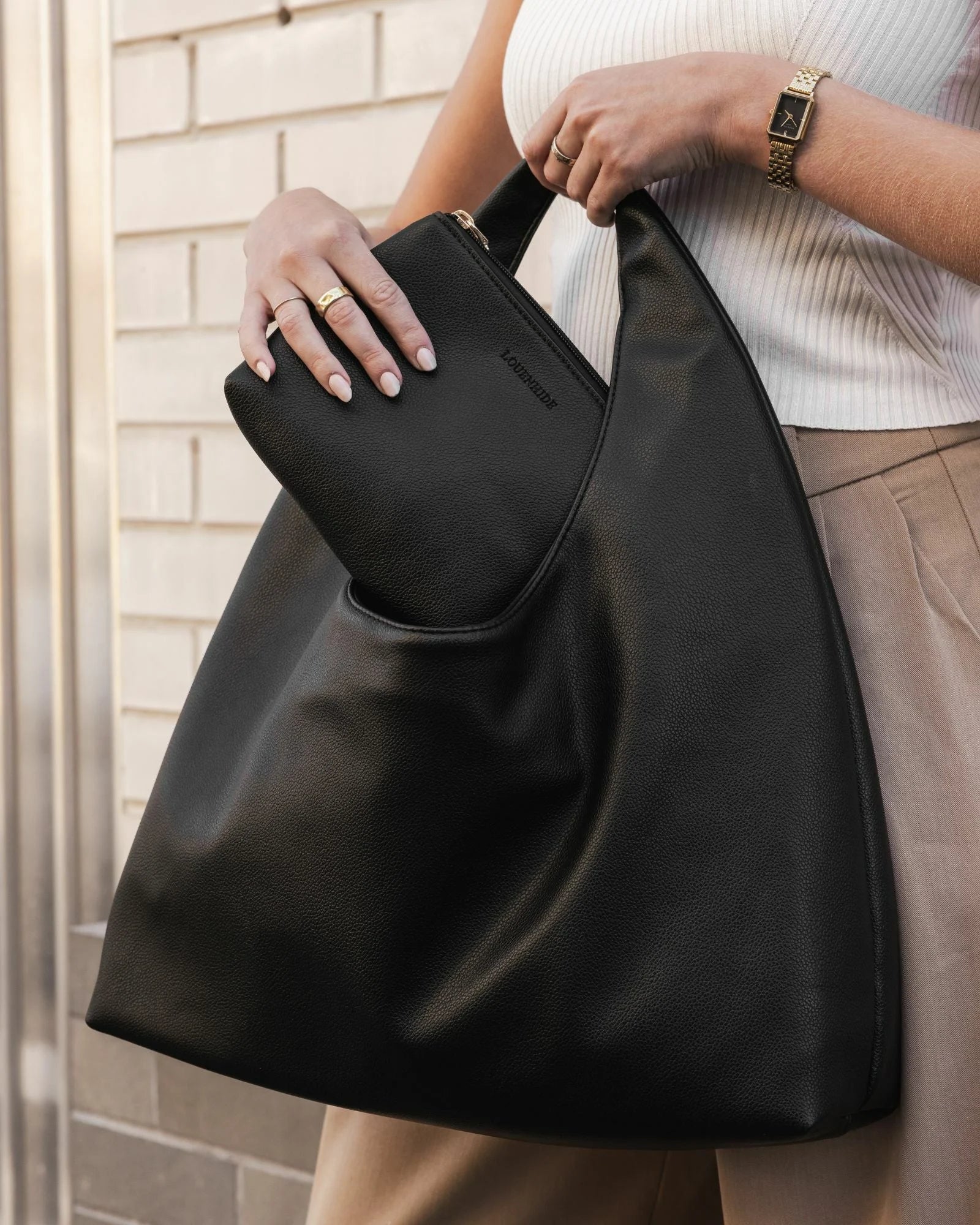 The Louenhide Monaco Everyday Pouch Set is a versatile duo that blends effortless style with practical functionality. Featuring the slouchy elegance of the Monaco Shoulder Bag and the clean design of the Everyday Pouch, this set is perfect for carrying and organizing your essentials with ease. Whether you’re heading to work, lunch with friends, or running errands, the Monaco’s spacious interior and the Everyday Pouch’s streamlined storage keep you stylishly prepared for any occasion. Seamlessly coordinated,
