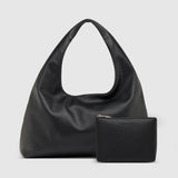 The Louenhide Monaco Everyday Pouch Set is a versatile duo that blends effortless style with practical functionality. Featuring the slouchy elegance of the Monaco Shoulder Bag and the clean design of the Everyday Pouch, this set is perfect for carrying and organizing your essentials with ease. Whether you’re heading to work, lunch with friends, or running errands, the Monaco’s spacious interior and the Everyday Pouch’s streamlined storage keep you stylishly prepared for any occasion. Seamlessly coordinated,