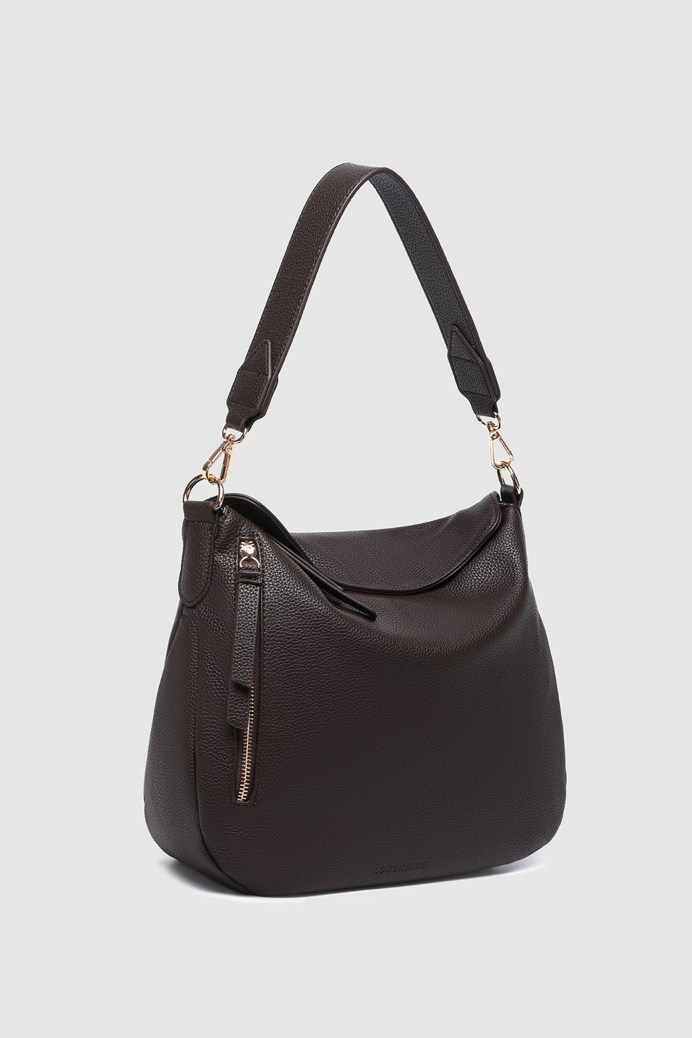 Brown handbag with a strap on a light gray background