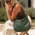 The Louenhide Nadia Shoulder Bag is your new go-to when your day calls for casual styling. Whether you’re running errands or heading off to lunch, the relaxed and slouchy silhouette allows you to fit all your essentials, while maintaining a compact and slender fit under your arm. With a bonus strap inside, completely customize your look from a comfortable shoulder bag to a practical crossbody.&nbsp; Make every day easy with this multi-wear everyday shoulder bag.