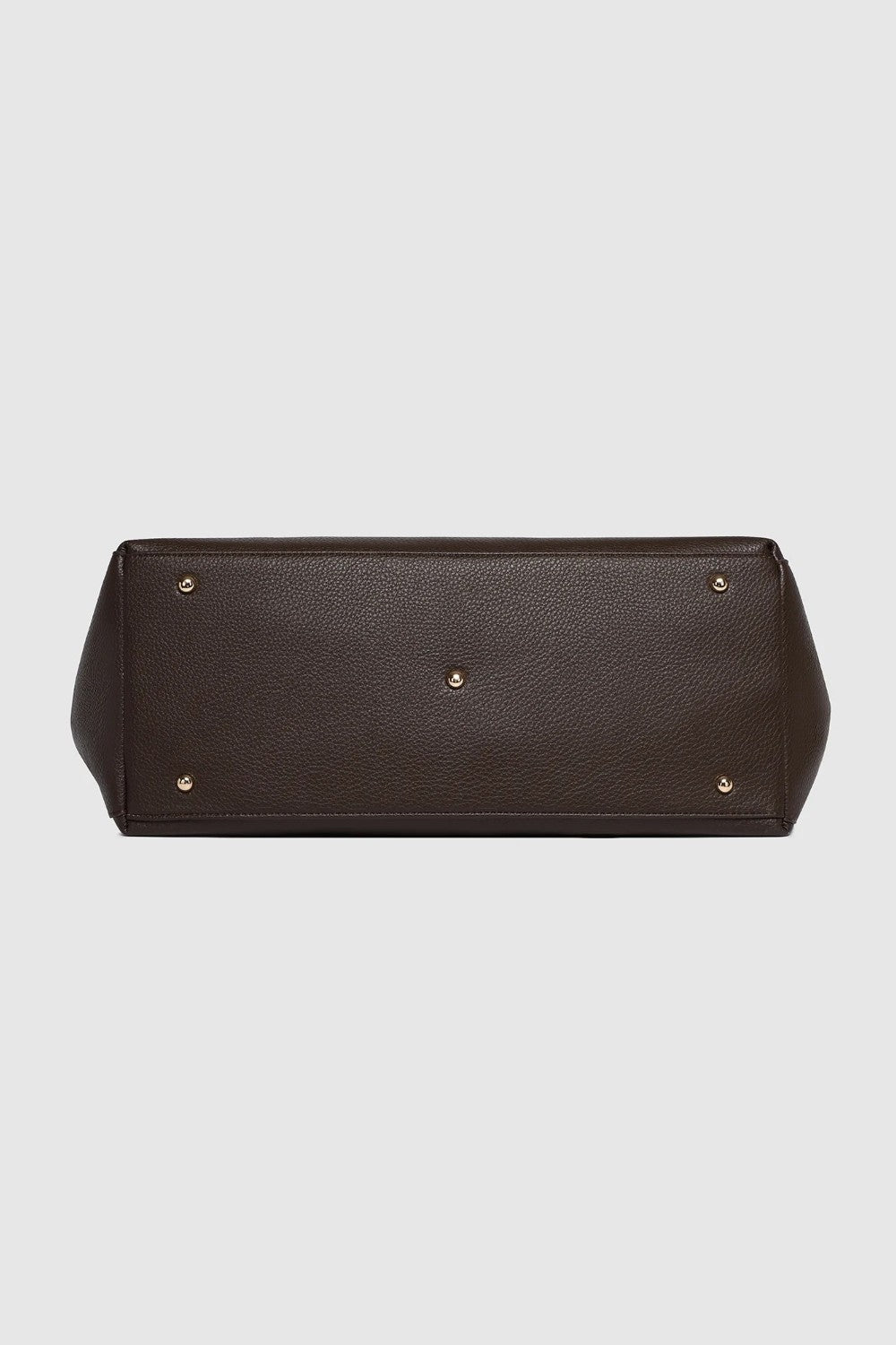 Bottom of large brown bag with gold coloured feet.