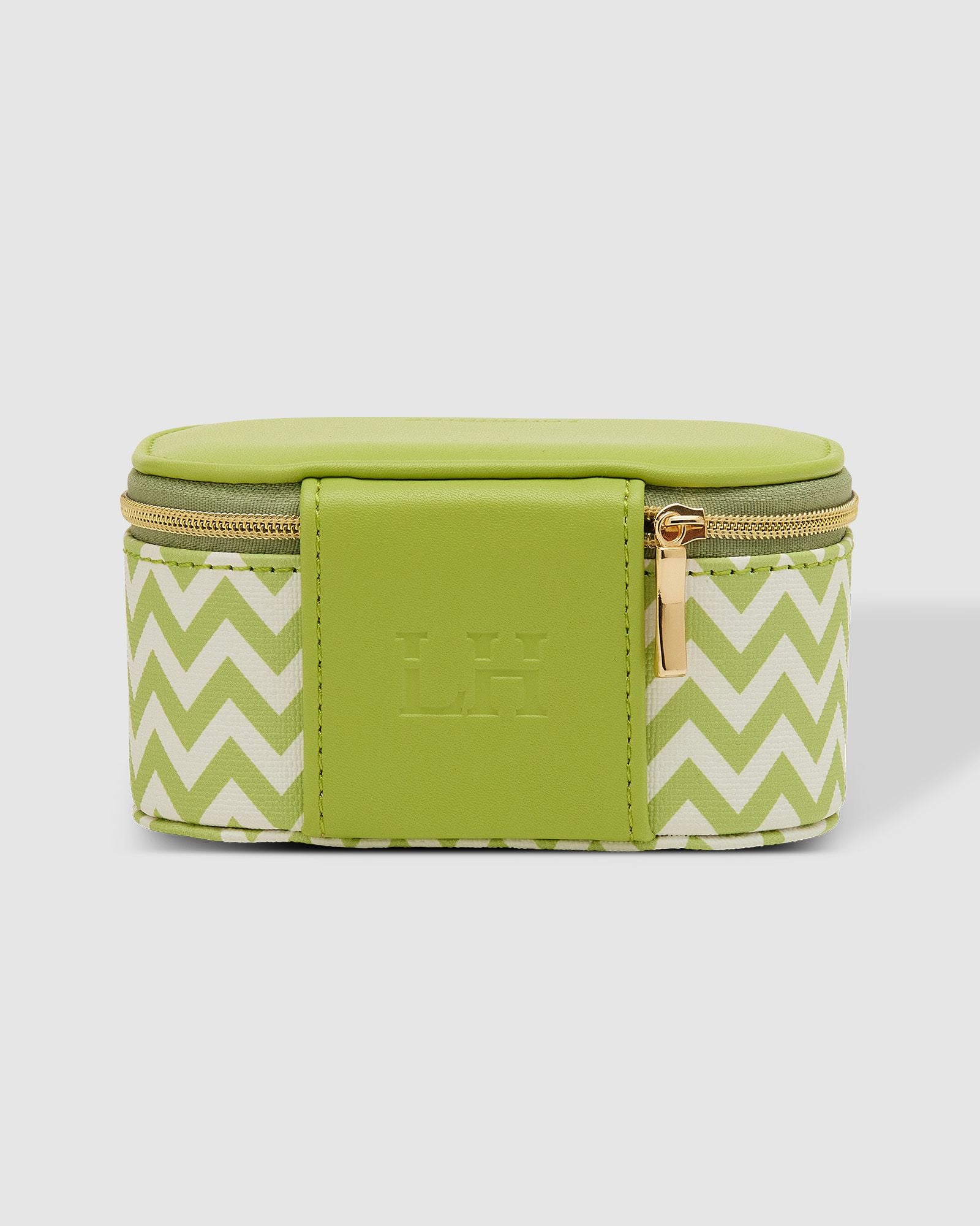 The Louenhide Olive Jewelry Box is a sweet oblong accessories box perfect for travel or everyday use. Keep your jewelry safe and secure in Olive’s separate compartments, elasticated pocket, and ring rolls. This affordable jewelry case is versatile and will fit comfortably in your handbag for on-the-go styling!