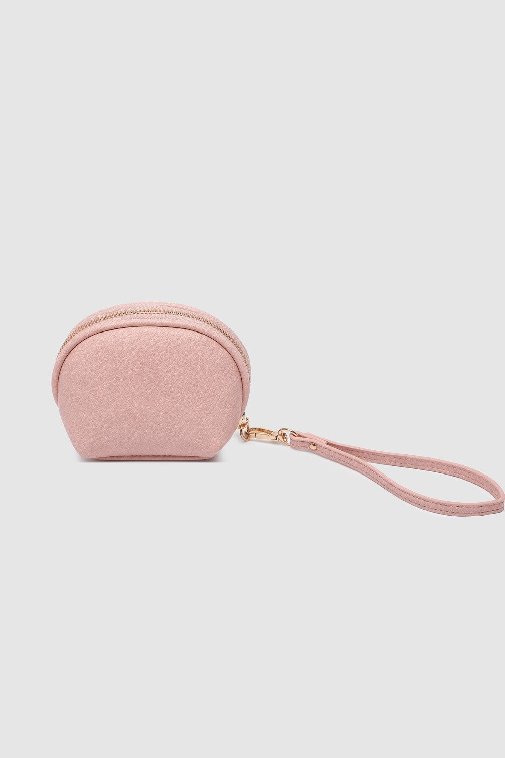Pink wristlet purse on a light gray background