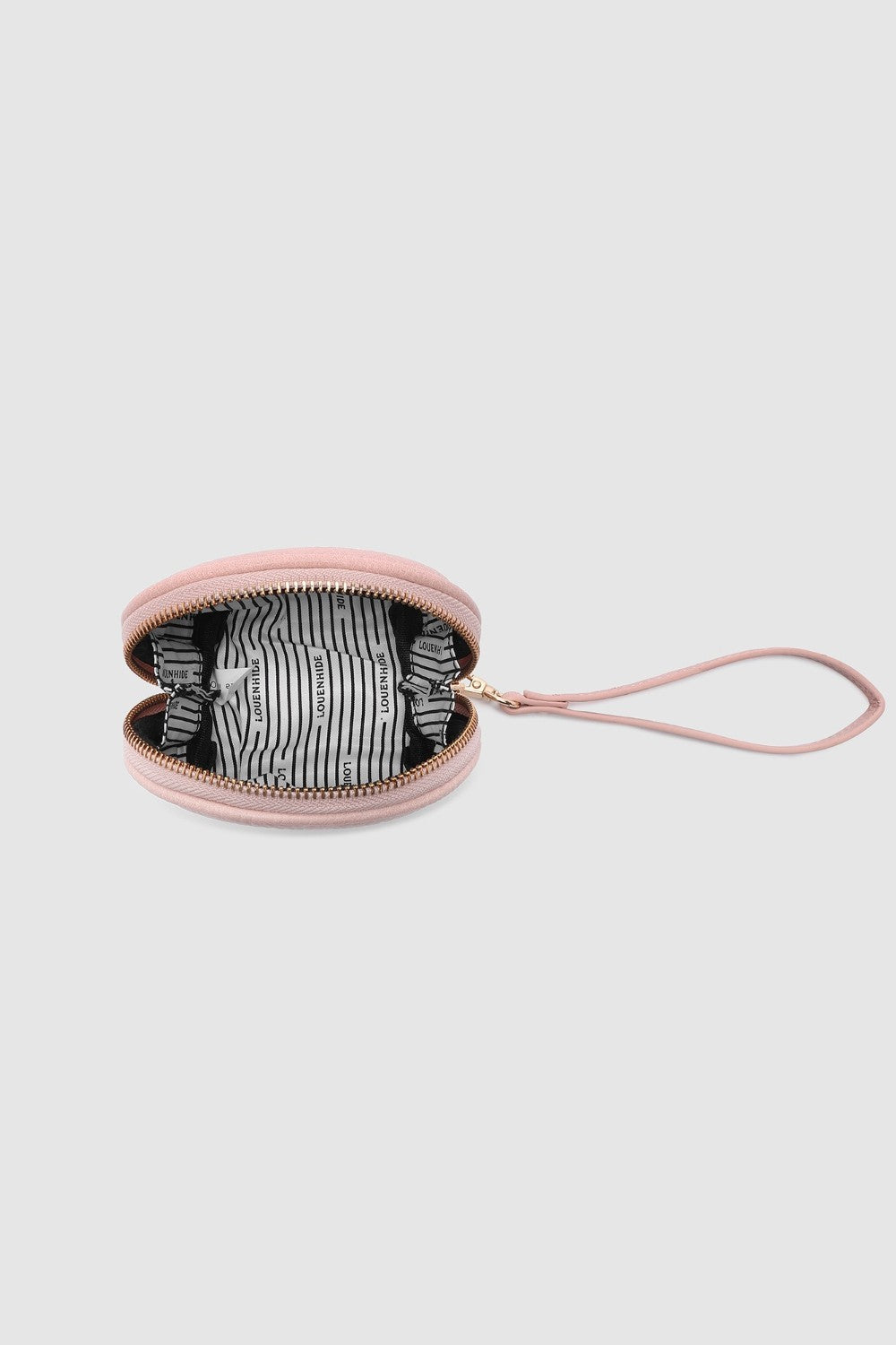 Open pink wristlet purse on a light gray background