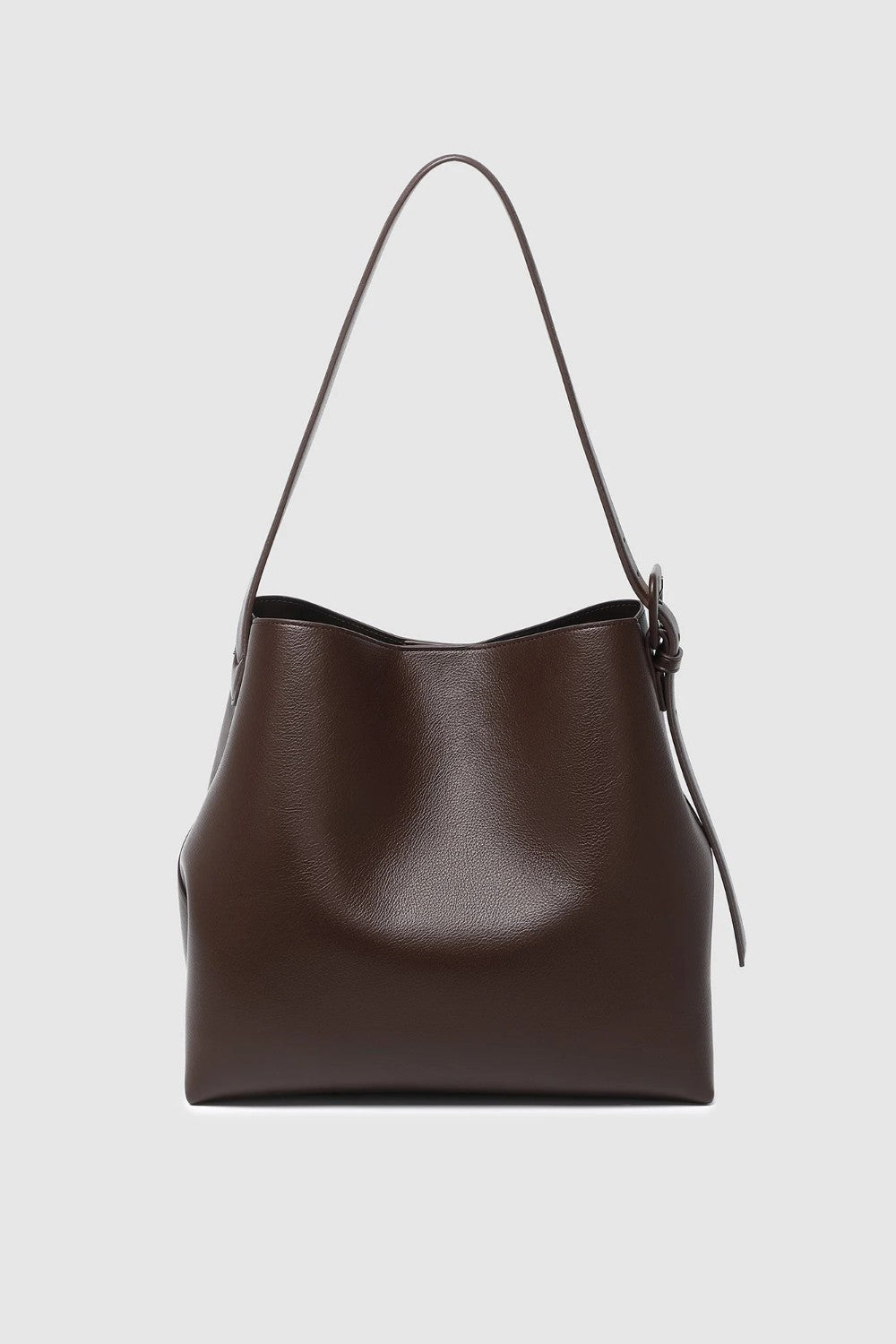 A dark brown leather shoulder bag with a single strap shown against a light gray background.