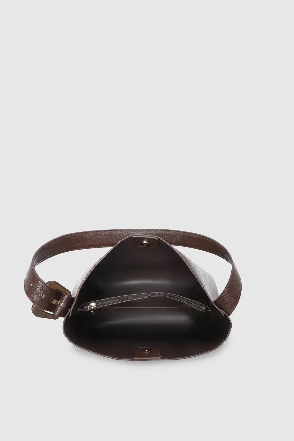 A dark brown leather bag shown from a top-down view on a light gray background.
